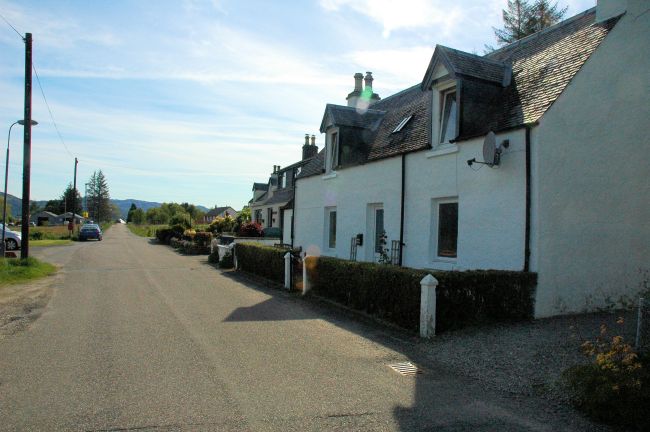 Bruaich Cottage stands at the side of a quiet side road towards the west end of Lochcarron village approximately 1 mile from the main centre of the village. This side road eventually ends at the little hamlet of Ardaneaskan, about 4 miles away, hence there is little passing traffic apart from local vehicles and the occasional visitor.